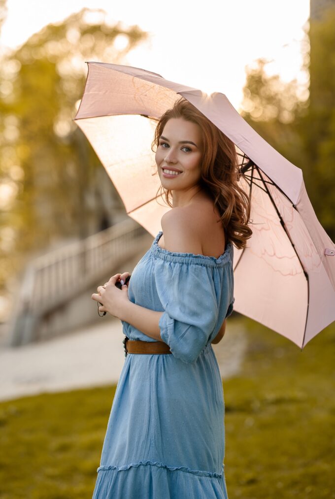 woman with pink umbrella